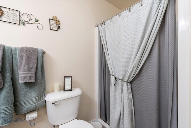 2309 Sturnella Ln, Belgrade, MT 59714 - bathroom featuring toilet and a shower with shower curtain