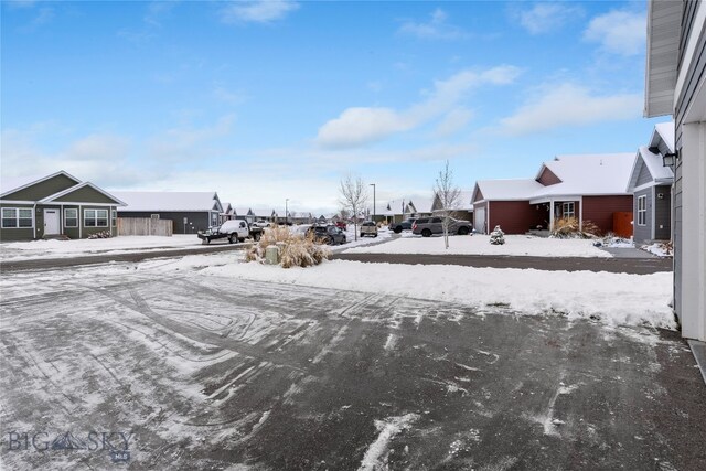 view of yard layered in snow