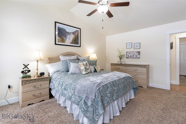 carpeted bedroom featuring ceiling fan and lofted ceiling