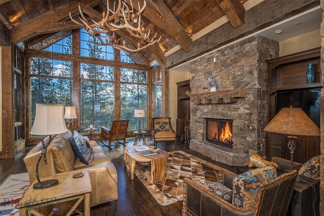 living room with a fireplace, beamed ceiling, high vaulted ceiling, and hardwood / wood-style flooring