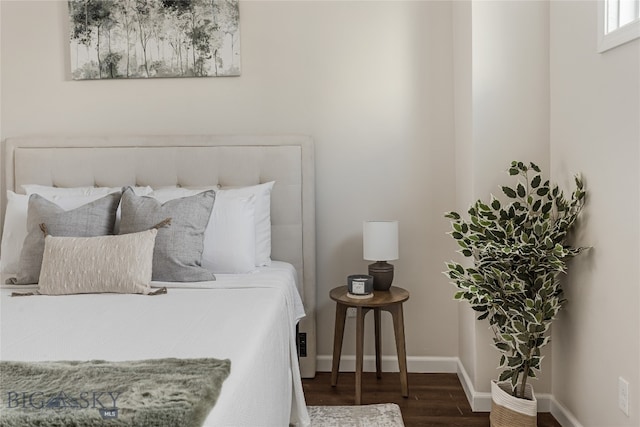 bedroom featuring dark hardwood / wood-style floors