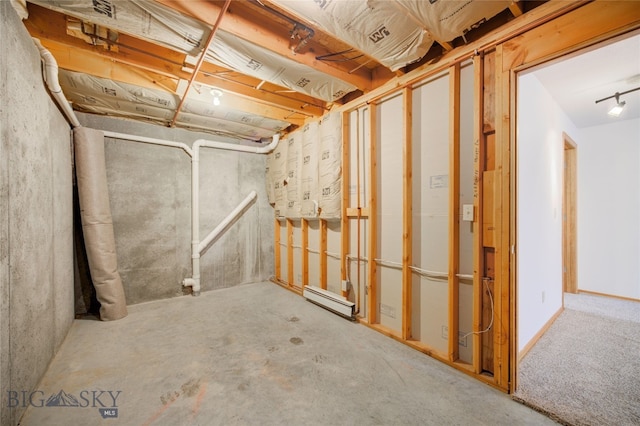 basement with baseboard heating