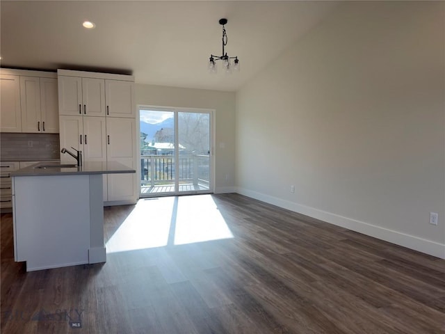 206 Otis Ave, Ennis, MT 59729 - unfurnished dining area featuring dark wood-style flooring, a chandelier, lofted ceiling, and recessed lighting