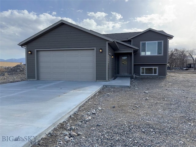 206 Otis Ave, Ennis, MT 59729 - view of front of property with driveway and a garage