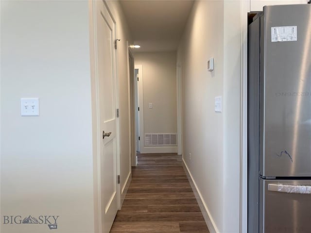 206 Otis Ave, Ennis, MT 59729 - hallway with dark wood-type flooring and baseboards