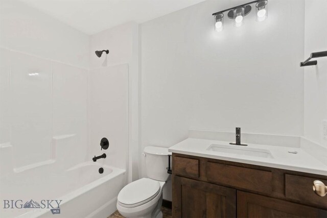 full bathroom featuring shower / bathing tub combination, vanity, and toilet