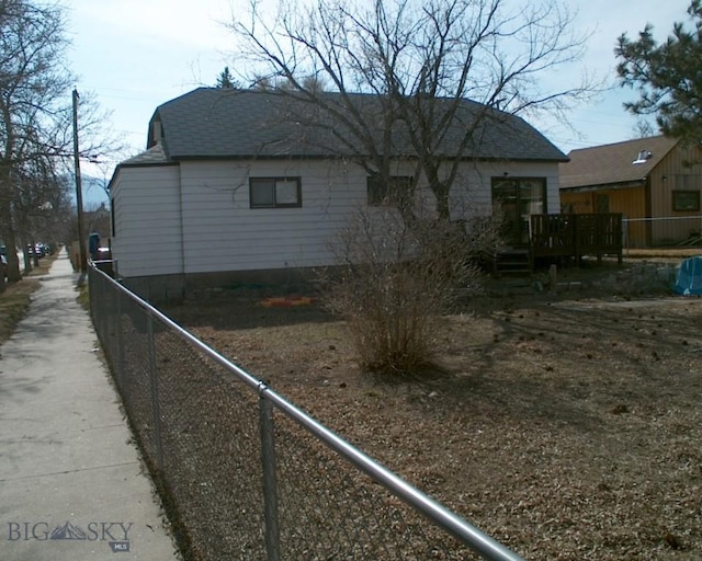 view of home's exterior featuring a deck