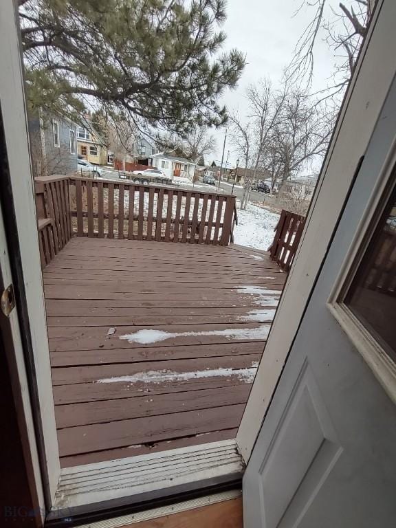 view of snow covered deck