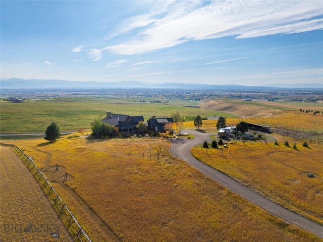 aerial view with a mountain view and a rural view