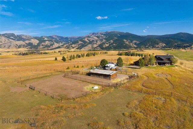 view of mountain feature with a rural view