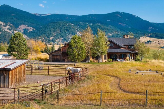 property view of mountains featuring a rural view