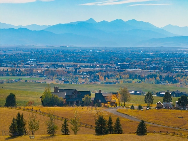 view of mountain feature with a rural view