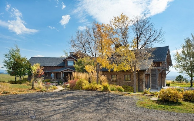 618 Autumn Ridge Rd, Bozeman, MT 59715 - view of front of house featuring stone siding