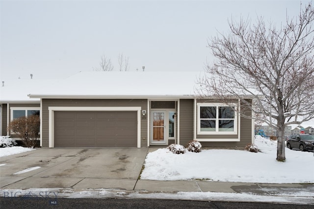 ranch-style home with a garage