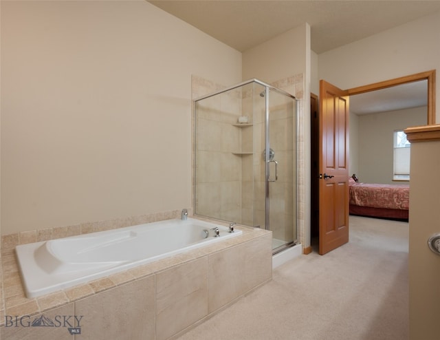 bathroom with shower with separate bathtub