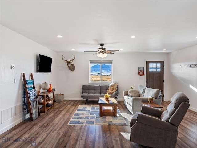 living area with recessed lighting, wood finished floors, visible vents, and ceiling fan