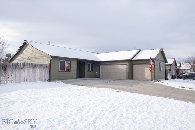 ranch-style home featuring a garage