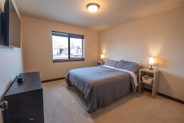 bedroom with light carpet