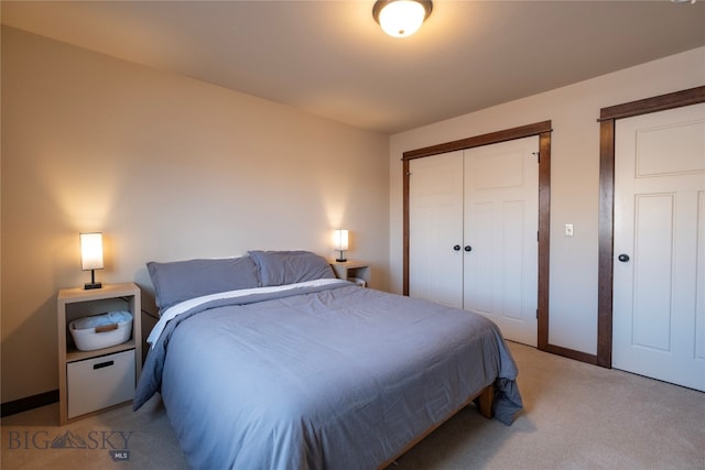 carpeted bedroom featuring a closet