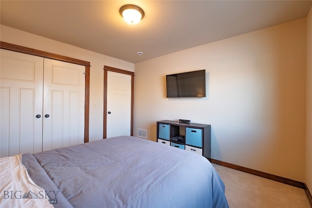 bedroom with light carpet