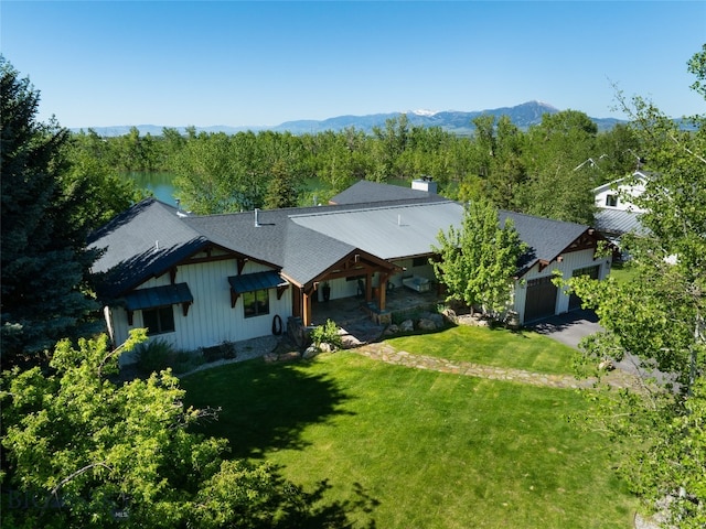 drone / aerial view featuring a mountain view