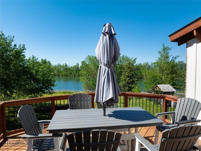 deck featuring a water view