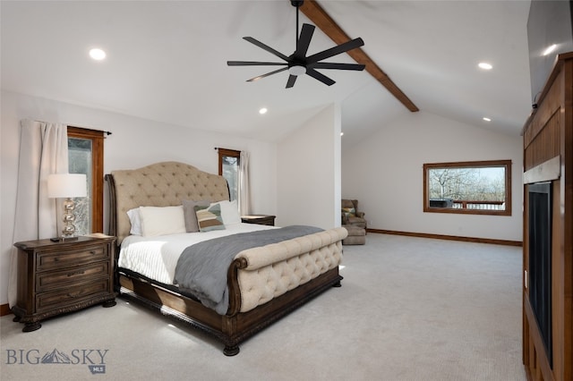 carpeted bedroom with vaulted ceiling with beams and ceiling fan