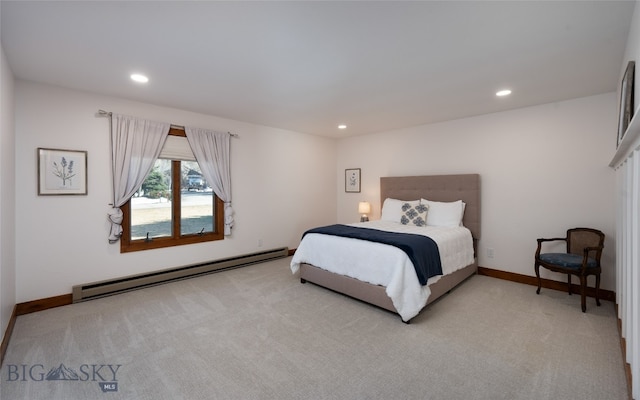 carpeted bedroom featuring a baseboard radiator