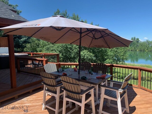 wooden terrace with a water view