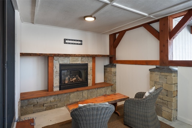 sitting room featuring a fireplace