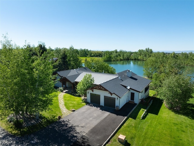 bird's eye view with a water view