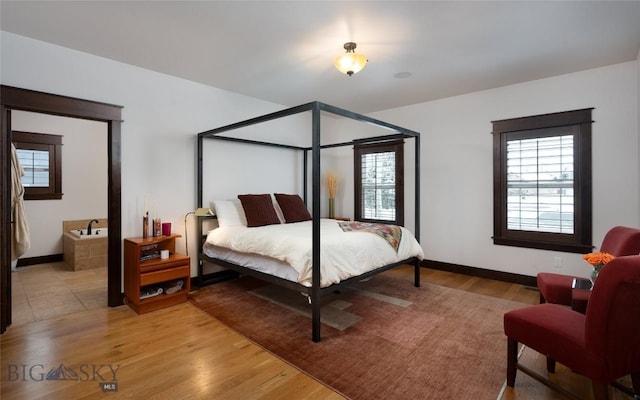 bedroom featuring light hardwood / wood-style floors