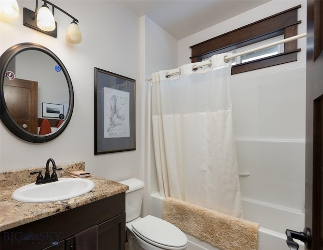 full bathroom with vanity, shower / tub combo with curtain, and toilet