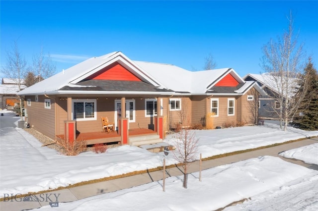 view of front of home with covered porch and central air condition unit