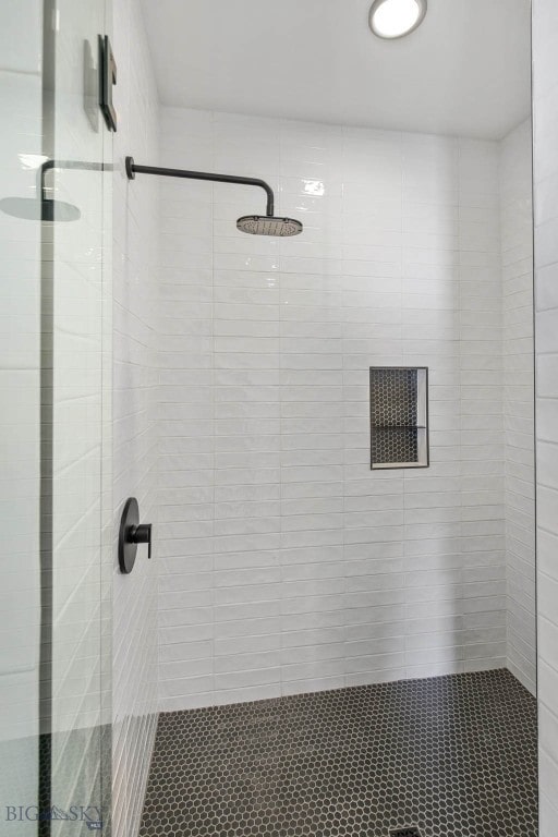 bathroom with an enclosed shower