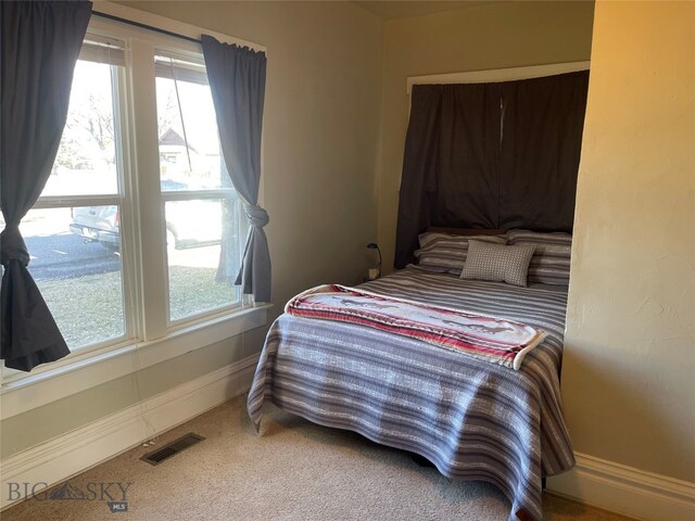 bedroom featuring carpet flooring