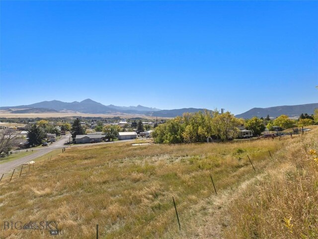 view of mountain feature with a rural view