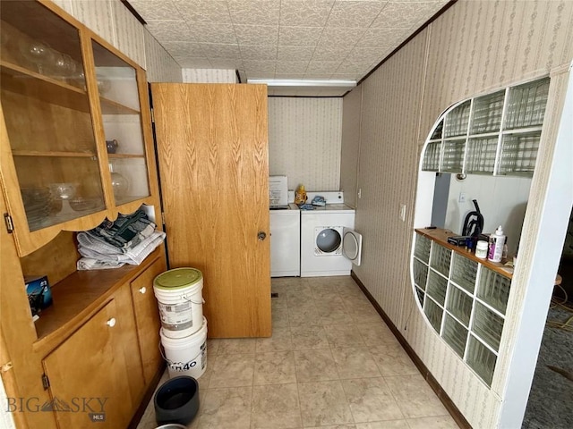 laundry room featuring separate washer and dryer