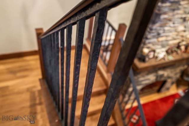 staircase featuring hardwood / wood-style flooring