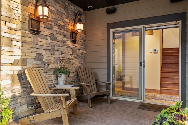 entrance to property featuring covered porch