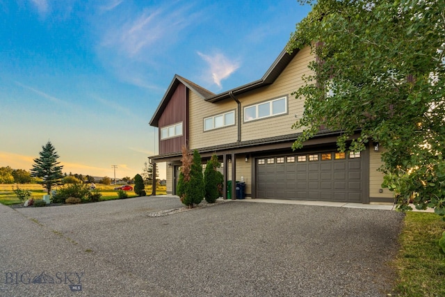 craftsman house with a garage