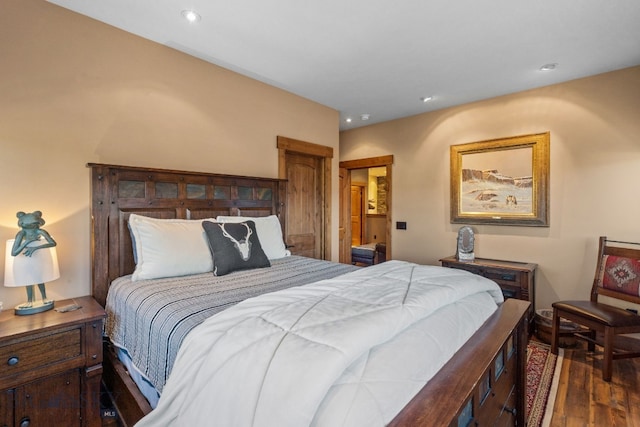 bedroom featuring dark hardwood / wood-style floors