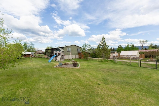 view of yard with a playground