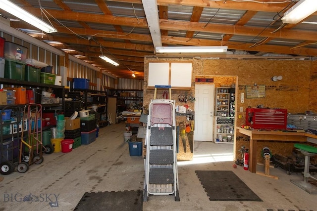 garage with a workshop area