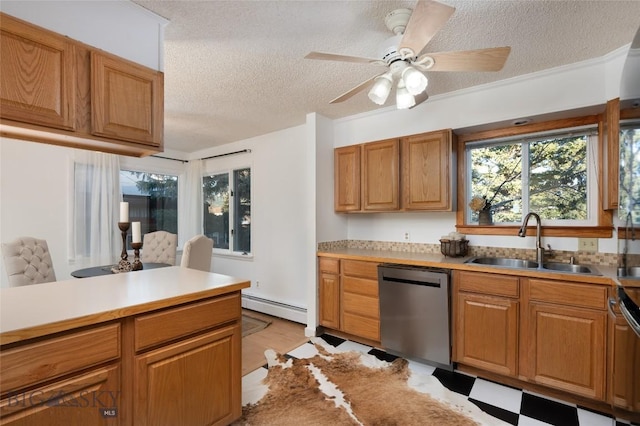 kitchen featuring a textured ceiling, dishwasher, a baseboard heating unit, and sink