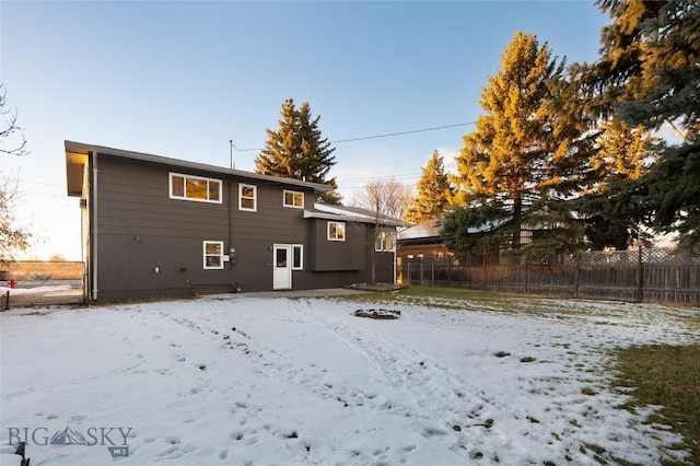 view of snow covered house