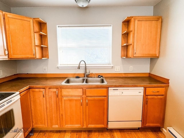 kitchen featuring white appliances, light hardwood / wood-style floors, sink, and a baseboard heating unit