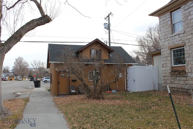 exterior space with a front lawn