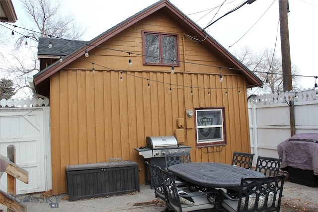 exterior space with a grill