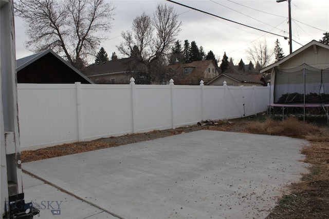 view of yard with a trampoline